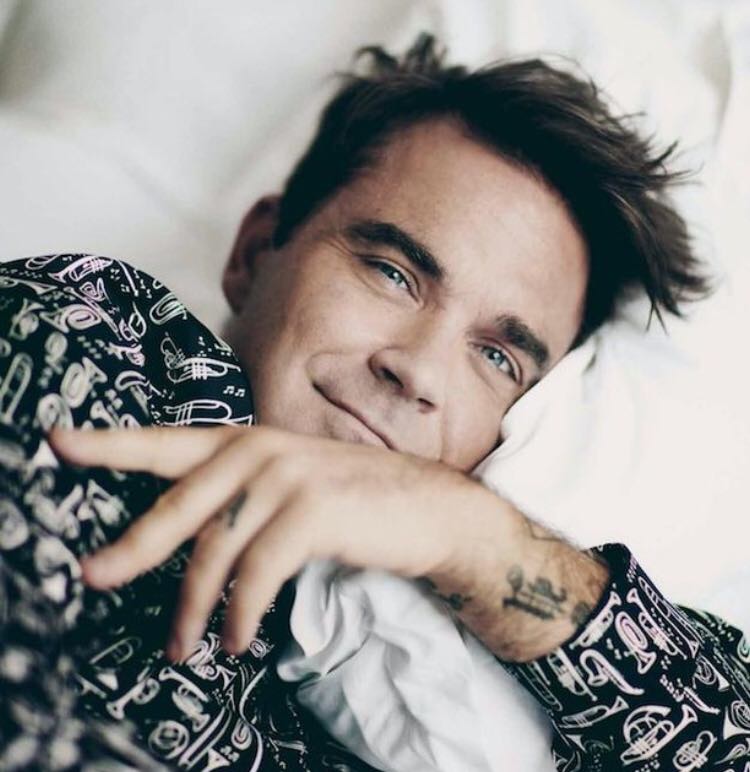 Robbie Williams va lansa primul său album de Crăciun
